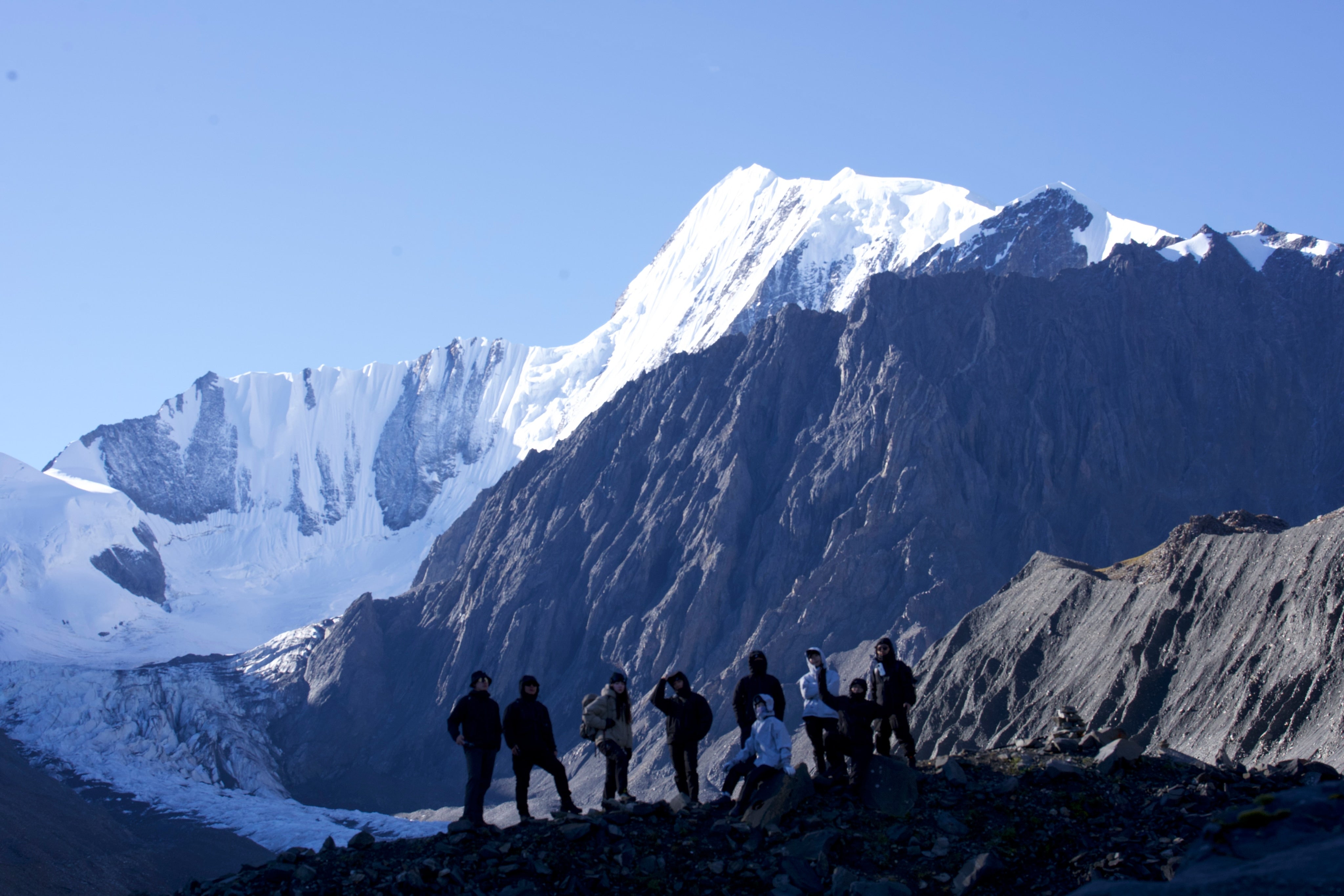 Explorers in a mountain landscape